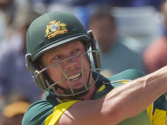 Australian batsman James Faulkner hits a six during the tri-series one-day cricket final between England and Australia at the WACA in Perth on February 1, 2015.   AFP PHOTO / TONY ASHBY RESTRICTED TO EDITORIAL USE - STRICTLY NO COMMERCIAL USE