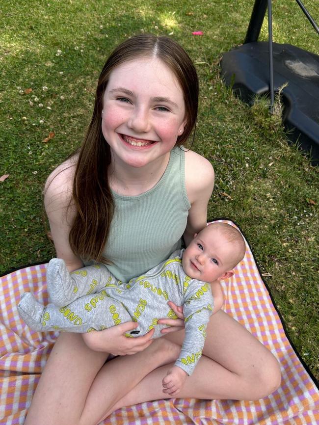 Charlotte O'Brien with her baby brother.