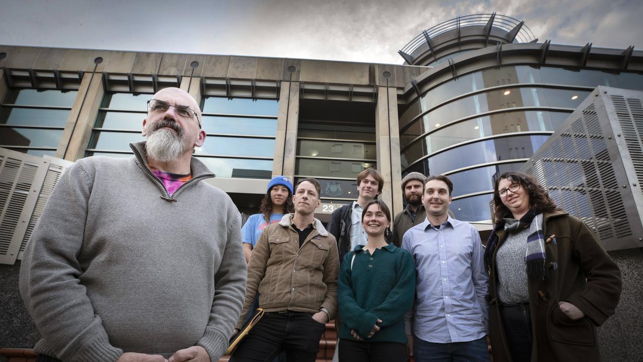 Bob Brown Foundation Tarkine campaigner Scott Jordan with Sakura Woods, Jimmy Cordwell, Darcy Wright, Ellen Maddock, Potto, Harrison Vermont and Tzigane Scholz- Talbot outside the Hobart Magistrates Court. Picture: Chris Kidd