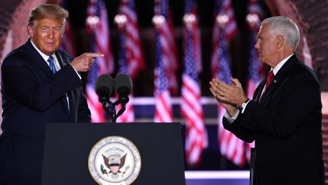 US President Donald Trump and Pence on stage. Picture: AFP