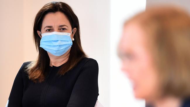 BRISBANE, AUSTRALIA - NewsWire Photos - JUNE 30, 2021.Queensland Premier Annastacia Palaszczuk watches Chief Health Officer Dr Jeannette Young during a Covid update press conference. Queensland has gone into a 3-day lockdown due to a Covid outbreak.Picture: NCA NewsWire / Dan Peled