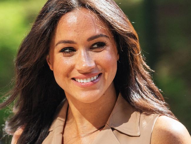 (FILES) In this file photo taken on October 01, 2019 Meghan Markle, the Duchess of Sussex arrives at the University of Johannesburg, South Africa. - Meghan Markle, Duchess of Sussex and wife of Britain's Prince Harry, is to produce an animated adventure series for Netflix about a 12-year-old girl who is inspired by historical female figures, her production company said on July 14, 2021. (Photo by Michele Spatari / AFP)