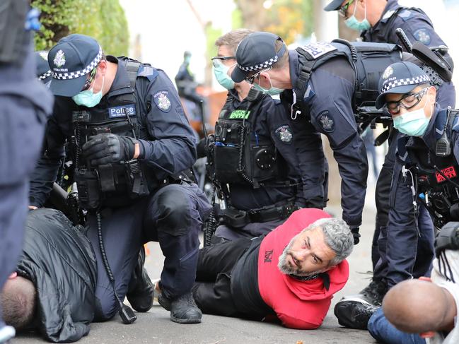 More than a dozen protesters were arrested for offences. Picture: Alex Coppel