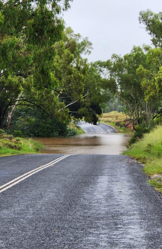 Floodwaters closed the roads heading in and out of Clermont Veterinary Surgery along Laglan St in Clermont. Picture: Supplied