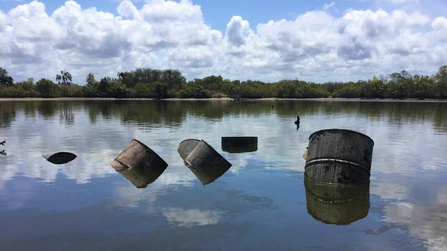 Drums dumped in a lagoon north of Yeppoon.