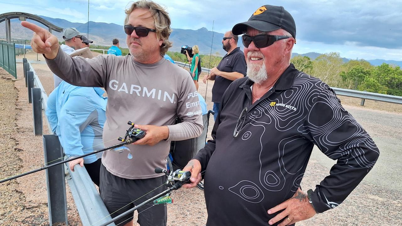 Local fishos Ian Moody and Graham Knight pretend that they're going fishing at Ross River Dam, while pointing out the local wildlife. that can be seen. Picture: Chris Burns.