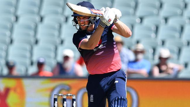 Chris Woakes counter-attacks in Adelaide. Picture: AAP