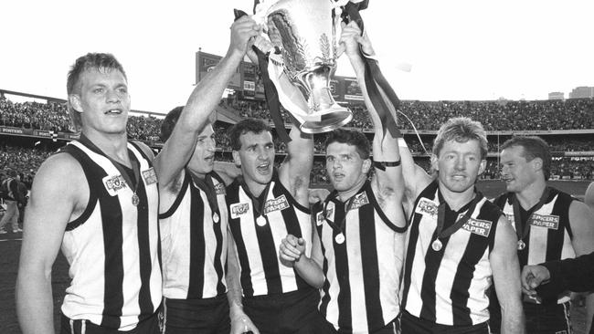 Darren Millane (centre) was one of the Magpies’ best on Grand Final day.