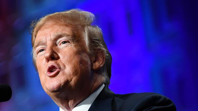 US President Donald Trump addresses the National Electrical Contractors Association Convention at the Pennsylvania Convention Center in Philadelphia, Pennsylvania on October 2, 2018. (Photo by MANDEL NGAN / AFP)