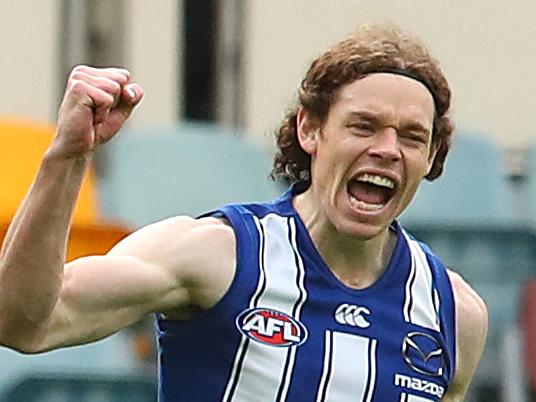 BRISBANE, AUSTRALIA - JULY 25: Ben Brown of the Kangaroos celebrates a goal during the round 8 AFL match between the North Melbourne Kangaroos and the Carlton Blues at The Gabba on July 25, 2020 in Brisbane, Australia. (Photo by Jono Searle/AFL Photos/via Getty Images)