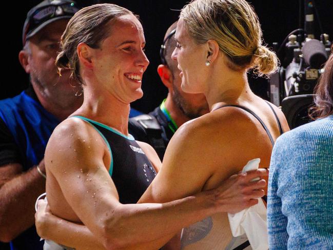 Bronte Campbell (L) embraces Shayna Jack following the women's 100m freestyle final. Picture: Patrick Hamilton / AFP
