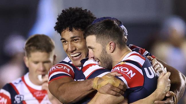 SYDNEY, AUSTRALIA - SEPTEMBER 09:  James Tedesco, Luke Keary and Siua Wong of the Roosters celebrate winning the NRL Elimination Final match between Cronulla Sharks and Sydney Roosters at PointsBet Stadium on September 09, 2023 in Sydney, Australia. (Photo by Mark Metcalfe/Getty Images)