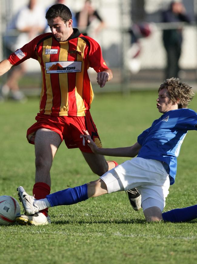 A young Craig Goodwin playing for Raiders tackles Francesco Monterosso.