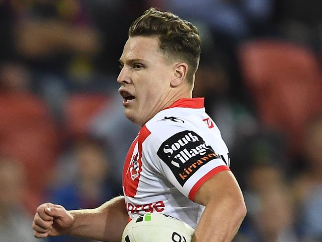 BRISBANE, AUSTRALIA - MAY 11: Jai Field of the Dragons makes a break on his way to score a try during the round nine NRL match between the New Zealand Warriors and the St George Illawarra Dragons at Suncorp Stadium on May 11, 2019 in Brisbane, Australia. (Photo by Ian Hitchcock/Getty Images)