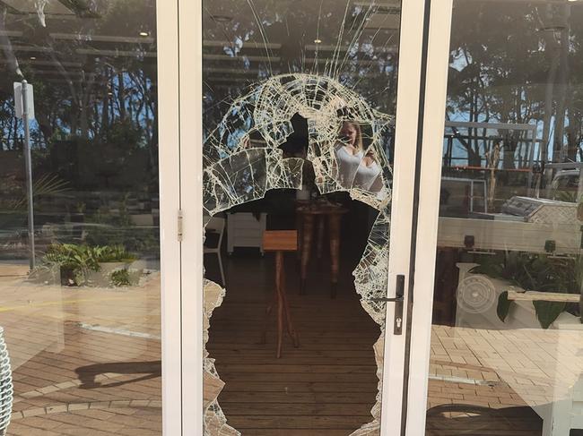 Thieves and vandals have smashed the storefronts of businesses across Hervey Bay. The scene at Banksia Bar and Grill.