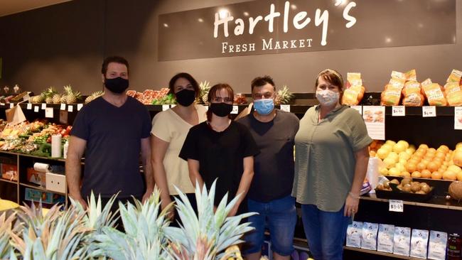 Volunteers from Cherry Street Sports Club and Northern Rivers Digital kept the Hartley's business open on Tuesday.