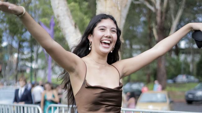 Emmaline Bowes is all smiles as she arrives for the Coffs Harbour Senior College formal.