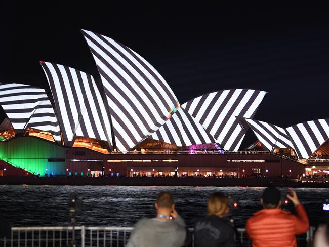 Crowds jostled for the best vantage points of see the Opera House. Picture: AFP