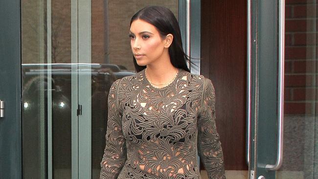 Kim Kardashian rocked the tummy tuckers and a whole lotta skin.