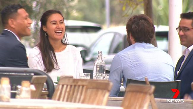 Israel Folau (left), with wife Maria and RUPA boss Prataal Raj (right) at a Sydney cafe on Friday. Picture: Channel 7.