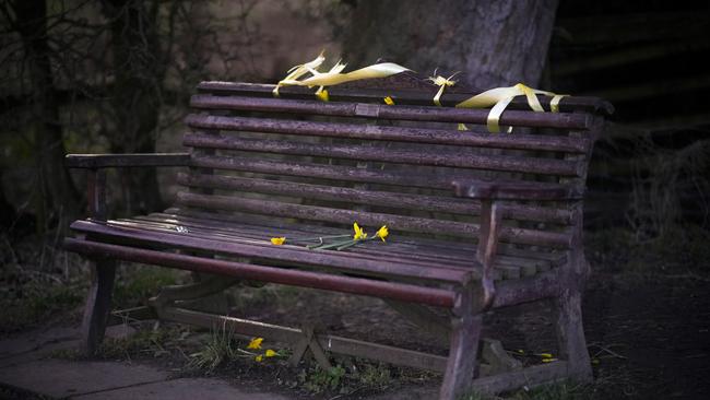 Ribbons and daffodils left in tribute to Nicola on the bench where her phone was discovered. Picture: Christopher Furlong/Getty Images