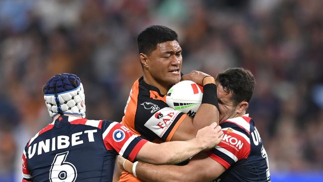 Wests Tigers' Stefano Utoikamanu's teammates were impressed by him standing up to JWH. Picture: NRL Images.