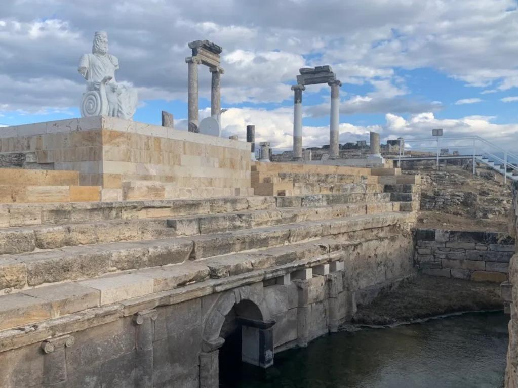 The stone archway is known as Pluto’s Gate, and was discovered among ruins by archaeologists in southwestern Turkey in 2013. Picture: Public Archive