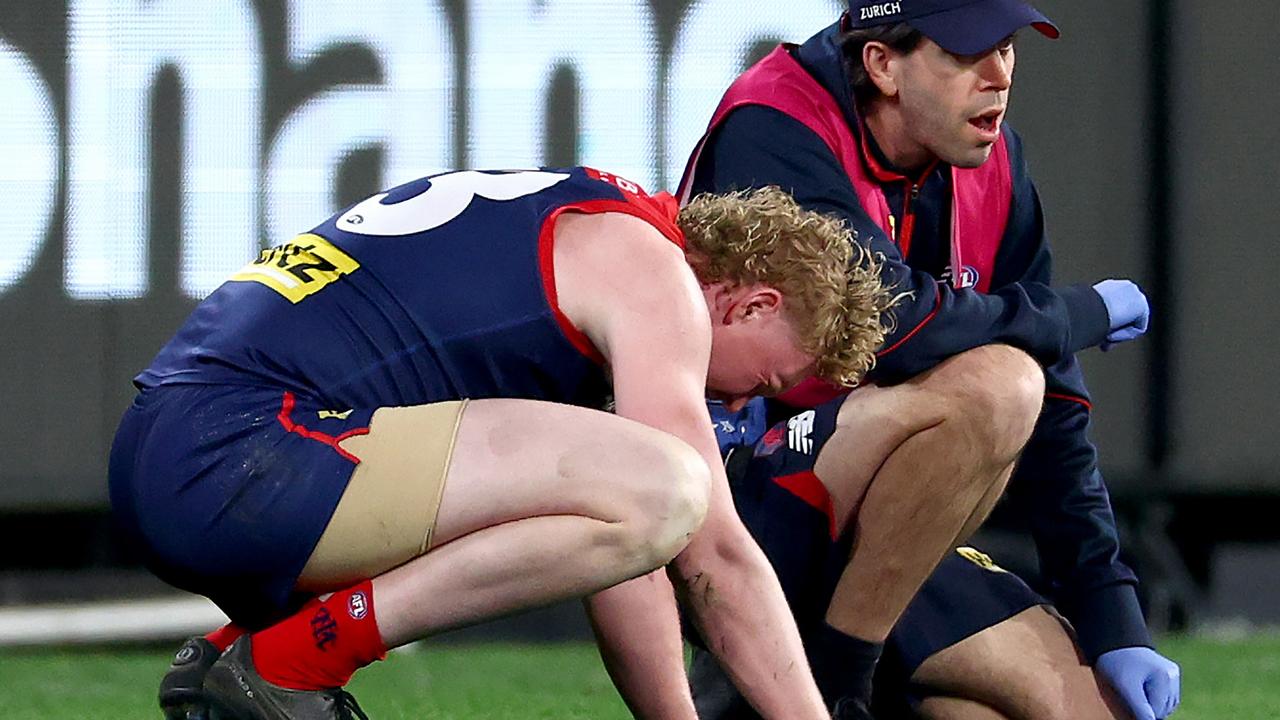 Clayton Oliver was floored by a shove to the sternum from Port Adelaide ruckman Jordon Sweet which could attract a fine from the MRO. Picture: Josh Chadwick / Getty Images