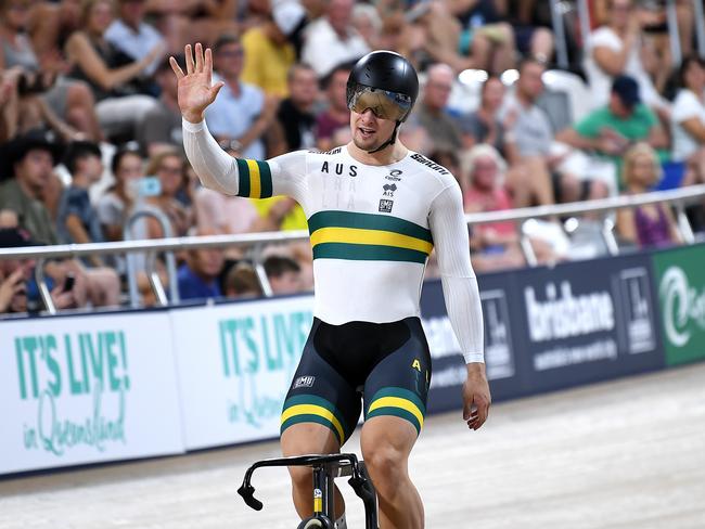 Australia's Matthew Glaetzer waves to the crowd after winning bronze in the men's sprint event at the Tissot UCI Track Cycling World Cup at the Anna Meares Velodrome in Brisbane, Sunday, December 15, 2019. (AAP Image/Dan Peled) NO ARCHIVING, EDITORIAL USE ONLY