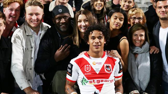 Tristan Sailor celebrates his NRL debut with his dad Wendell and mum Tara at Jubilee Stadium last weekend. Picture: Getty Images