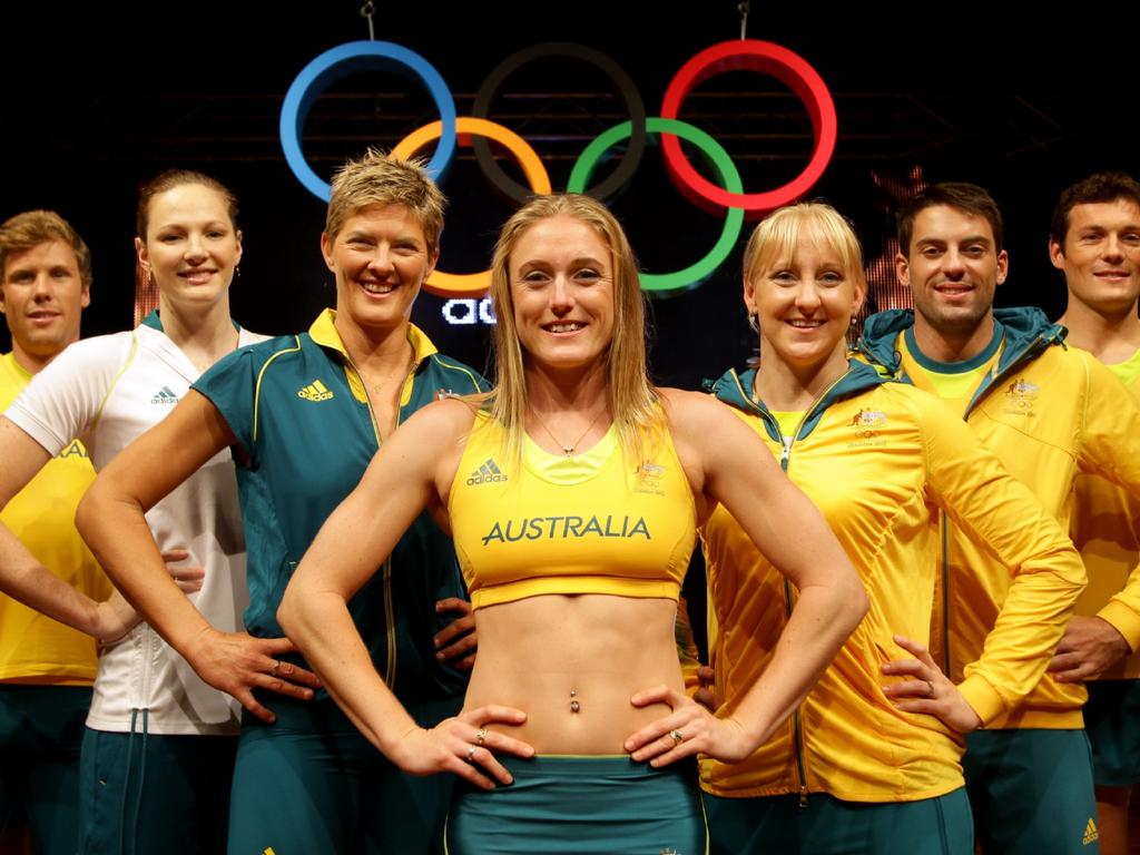 Henry Frayne , Cate Campbell , Natalie Cook , Sally Pearson , Jessicah Schipper , Mitchell Watt , and Craig Mottram show off the 2012 outfits . Pic Gregg Porteous