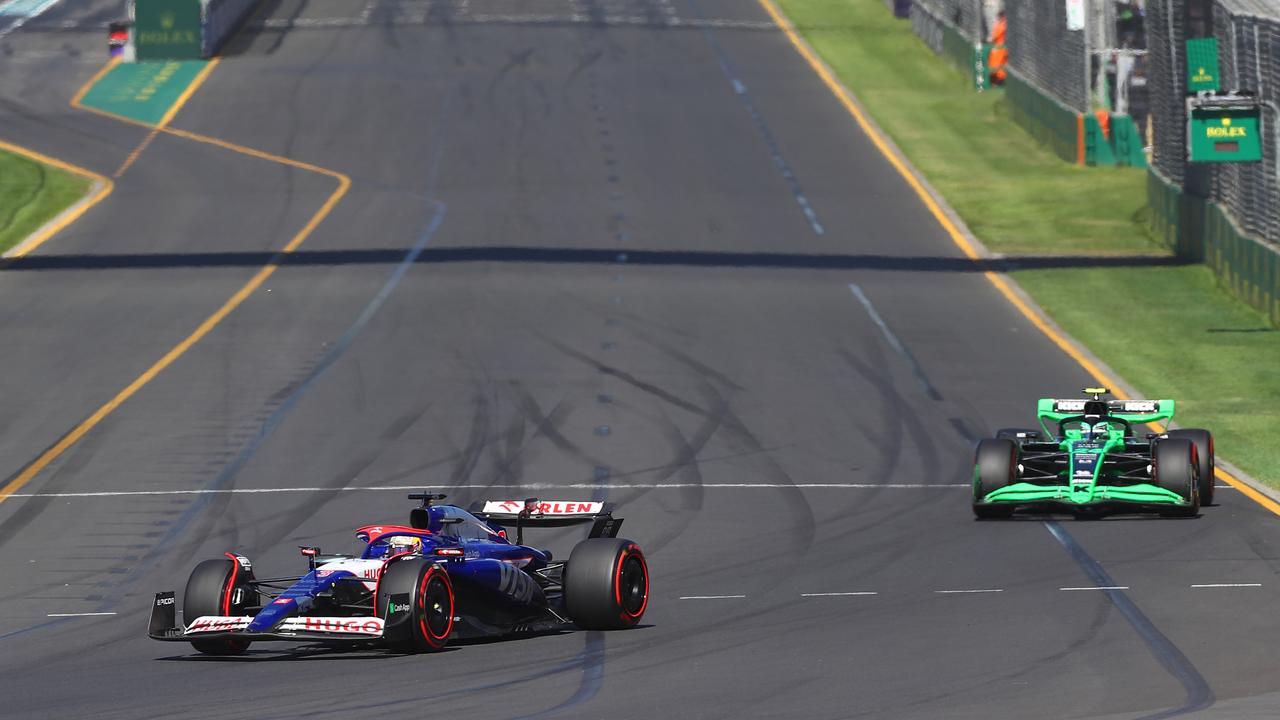 Daniel Ricciardo leads Zhou Guanyu of China. Photo by Peter Fox/Getty Images.