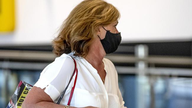 Jodi Grollo — Karen from Brighton — departs for Darwin at Melbourne Airport. Picture: David Geraghty