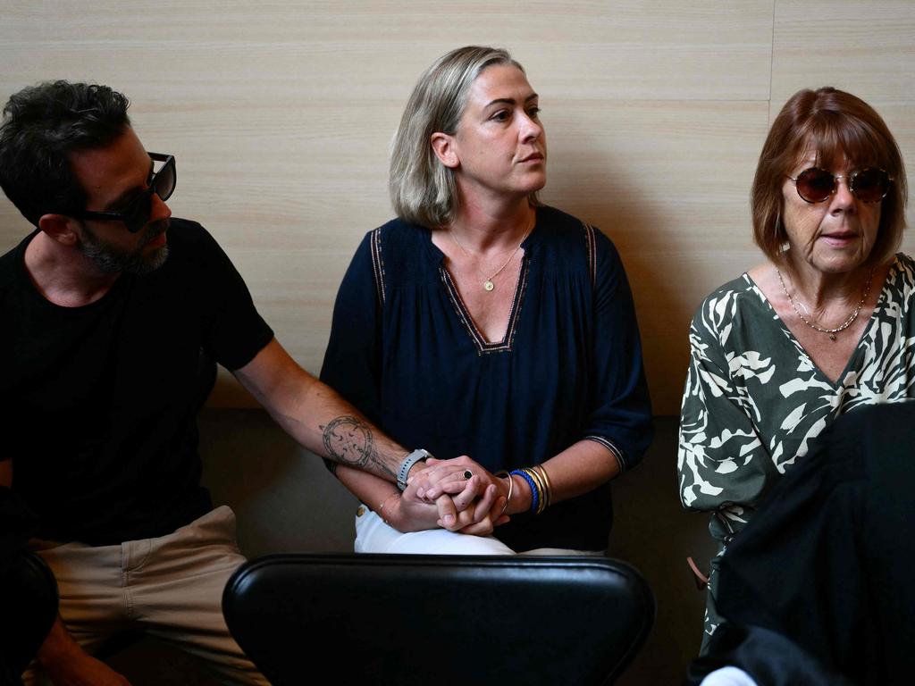 Gisele P. (right) was allegedly raped while unconscious dozens of times. She was joined in court by her daughter Caroline Darian (centre) and son Florian P. (left). Picture: Christophe SIMON / AFP