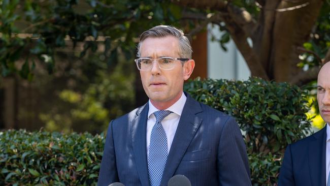 The Premier was visibly upset during the announcement at a press conference. Picture NCA NewsWire / Seb Haggett