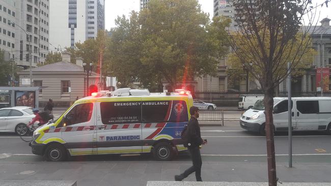 An ambulance out the front of Melbourne’s Federal Court building after a witness under cr