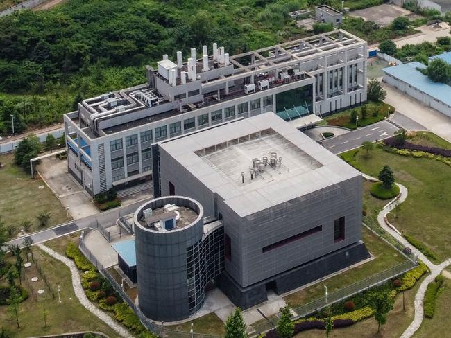 This aerial view shows the P4 laboratory (L) on the campus of the Wuhan Institute of Virology in Wuhan in China's central Hubei province on May 27, 2020. - Opened in 2018, the P4 lab conducts research on the world's most dangerous diseases and has been accused by some top US officials of being the source of the COVID-19 coronavirus pandemic. China's foreign minister on May 24 said the country was "open" to international cooperation to identify the source of the disease, but any investigation must be led by the World Health Organization and "free of political interference". (Photo by Hector RETAMAL / AFP)