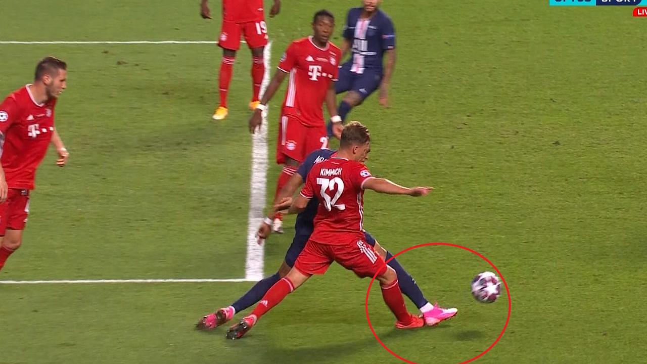 Is this a penalty? Mbappe goes down under a challenge from Bayern's Joshua Kimmich.
