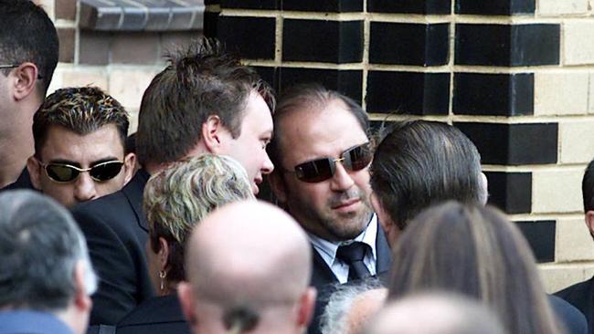 Mokbel and Williams at the funeral for Andrew Veniamin in Sunshine in 2004. Picture: Colin Murty