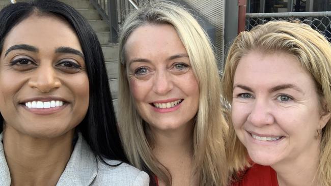 SYDNEY, AUSTRALIA - NewsWire Photos MARCH 16, 2023: (L-R) NSW Labor candidate for Oatley Ash Ambihaipahar, partner of Prime Minister Anthony Albanese, Jodie Haydon, and wife of NSW Labor leader Chris Minns, Anna Minns take a selfie whilst handing out pamphlets at Mortdale Station ahead of the 2023 NSW Election. Picture: NCA NewsWire