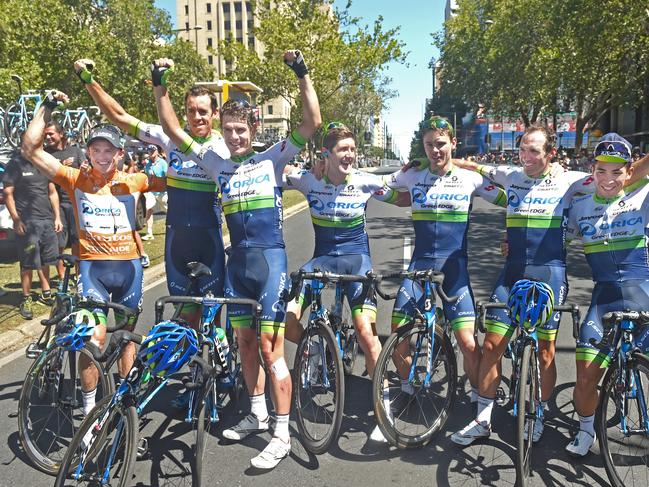 24/01/16 - Orica GreenEDGE team mates celebrate Simon Gerrans (left) winning the 2016 Tour Down Under in Adelaide. Photo Tom Huntley