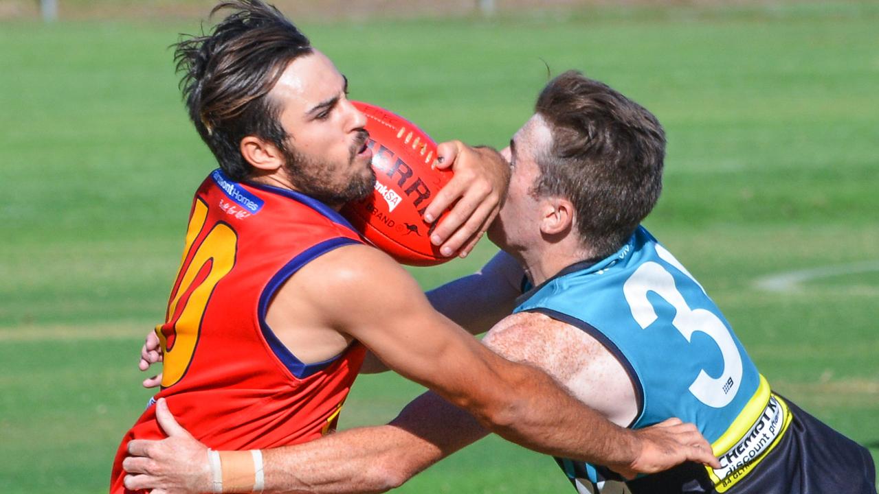 AMATEUR FOOTY: Portland v Flinders Park, Saturday, April 6, 2019. Nathan Lornie from Flinders Park is tackled by Portland's Max Buckley. (AAP Image/Brenton Edwards)