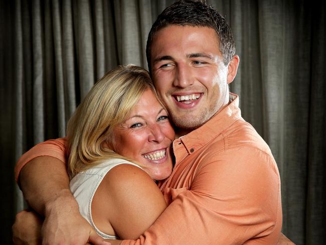 Sam Burgess gives his biggest supporter, mum Julie, a hug.