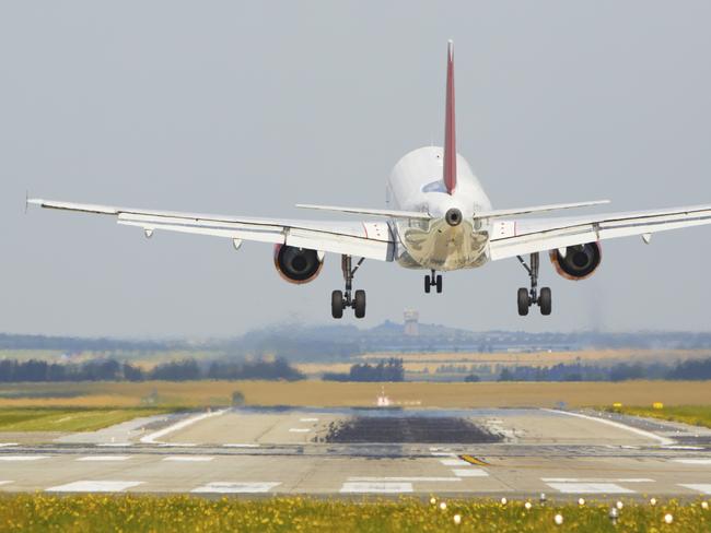 Airplane is landing at the airport