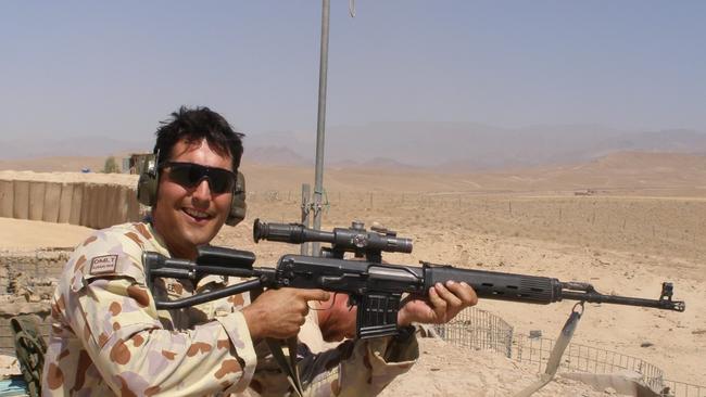 Former Corporal Rob Lee, pictured on duty in Afghanistan in 2010, suffers PTSD, depression, and a litany of physical injuries after deployments to East Timor, Iraq and Afghanistan. Picture: supplied.