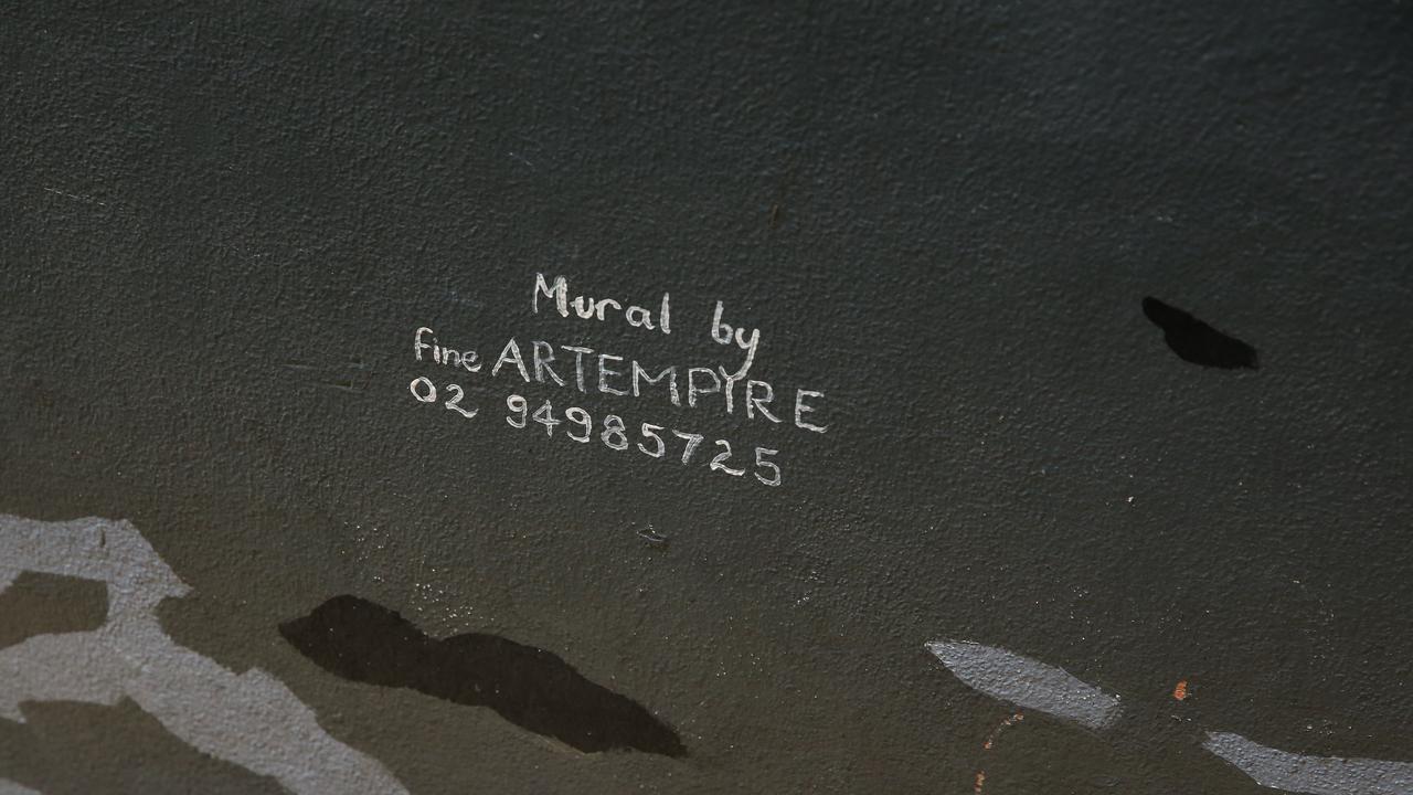 The mural in the Rocks is signed off by Mol’s business Fine Art Empire. Picture: Newswire/ Gaye Gerard