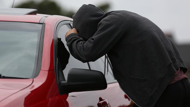 The court heard the 18 year old tried to get into a locked car but fled on foot when he realised cameras were watching. Picture: File