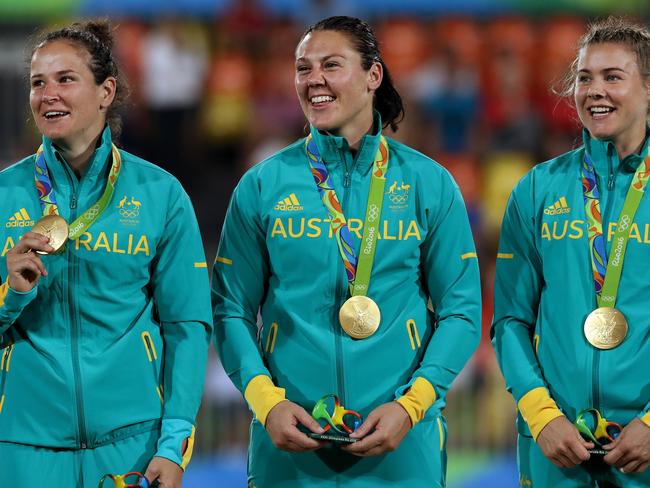 Shannon Parry, Sharni Williams and Nicole Beck celebrate winning the 2016 Rio Olympic Women's Rugby Sevens