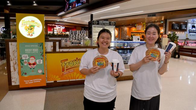 Jutarat Na Chiangmai and Ashley Lee show off the cookies in front of the Frosty Mango Hut. Picture: Evan Morgan