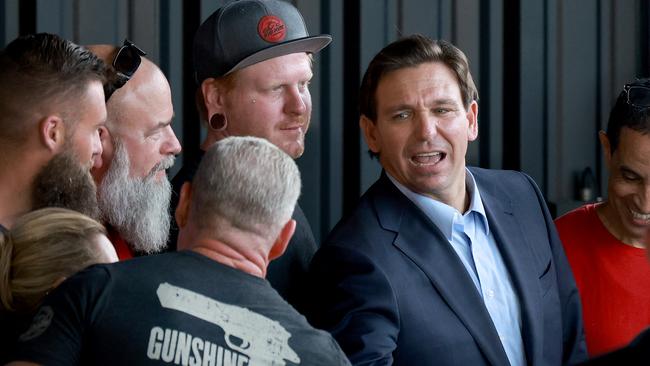 Ron DeSantis greets people during an event spotlighting his newly released book, “The Courage To Be Free: Florida’s Blueprint For America’’s Revival’. Picture: AFP.